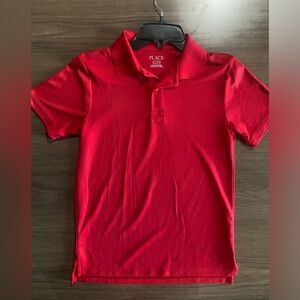 Boys Uniform Performance Classicred boys polo shirt size large (10/12)